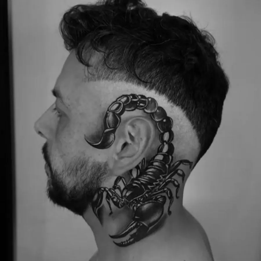 Black and grey scorpion tattoo on side of head